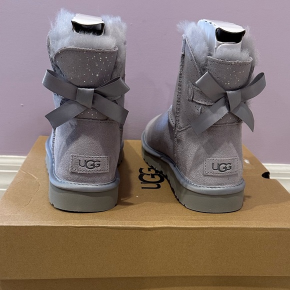 NIB UGG Mini Bailey Bow Metallic Spots Embellished Genuine Shearling Booties - Picture 9 of 12